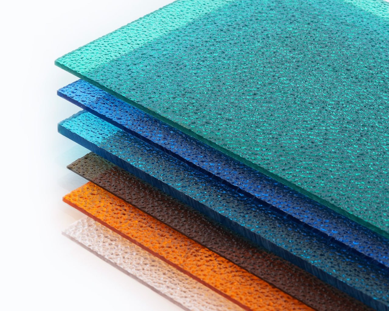 Colored polycarbonate glazing sheets — teal, blue, bronze, amber, clear